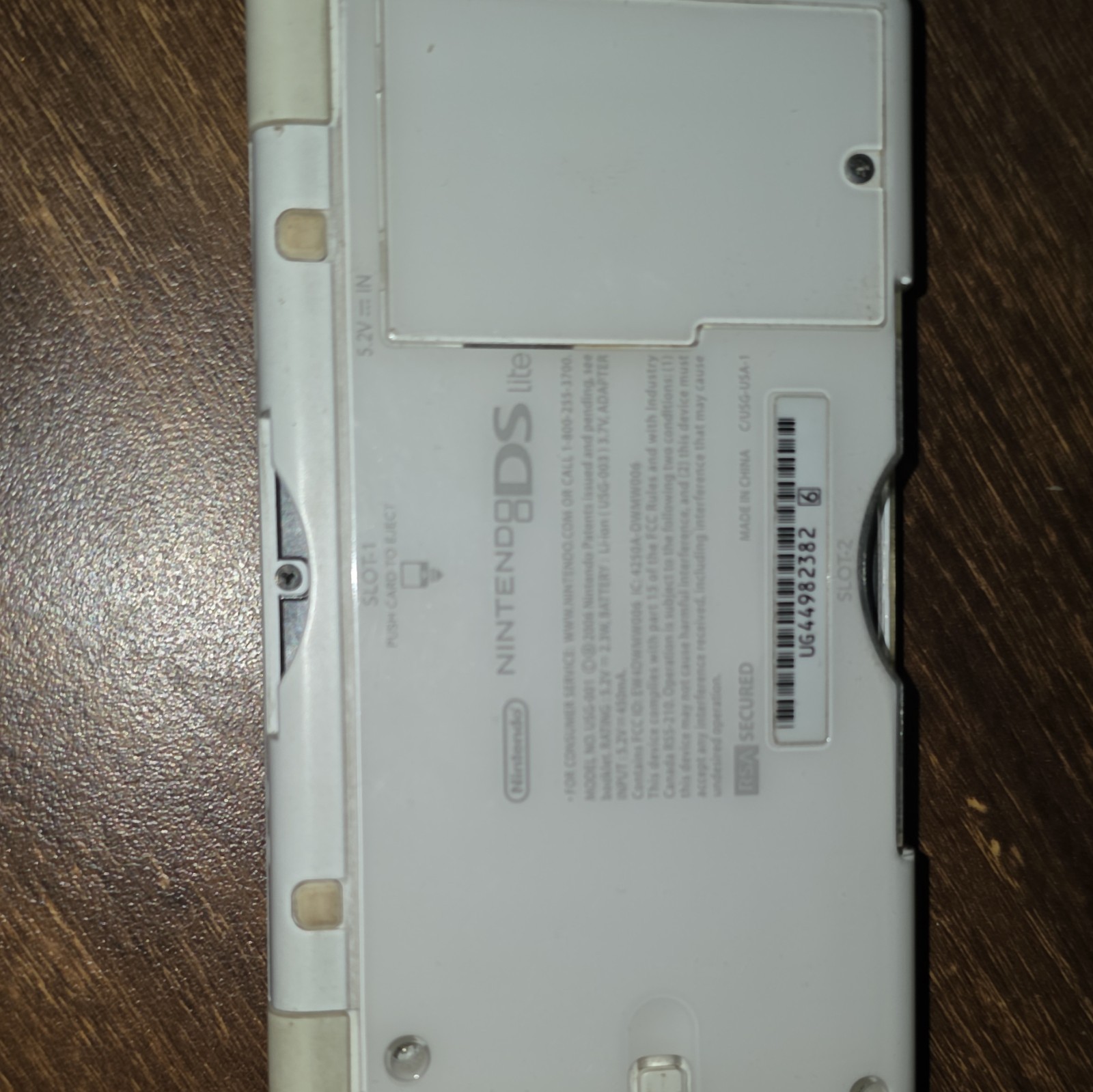 Nintendo DS Lite White Handheld System, Wi-Fi, Headphone Jack, USG-001 NTSC-U/C