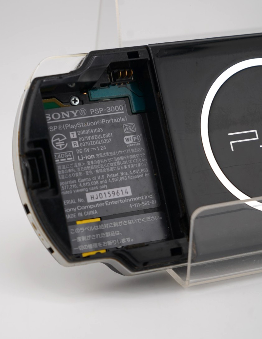 Sony PSP-3000 Console with OEM Battery, Game, 64GB SD, Case Bundle – Piano Black