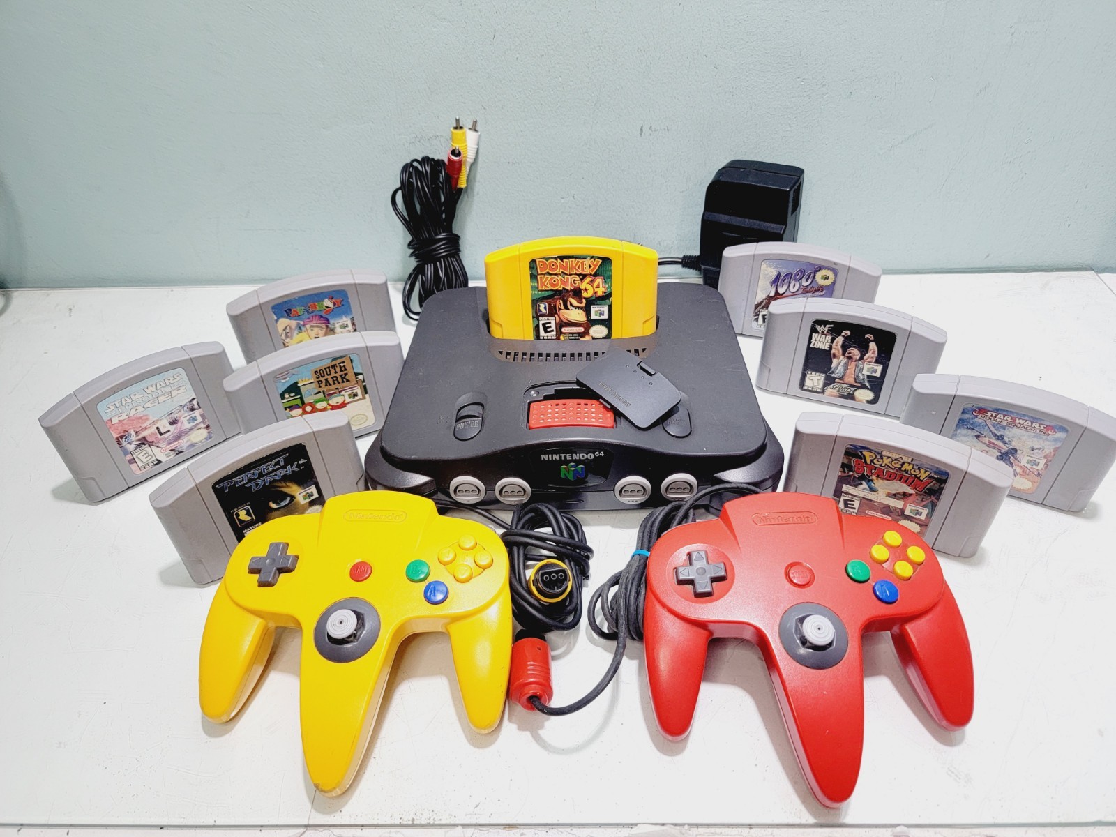 Nintendo 64 N64 Console Bundle w/ 2 Controllers & Dk + 8 Games Xpantion Pak