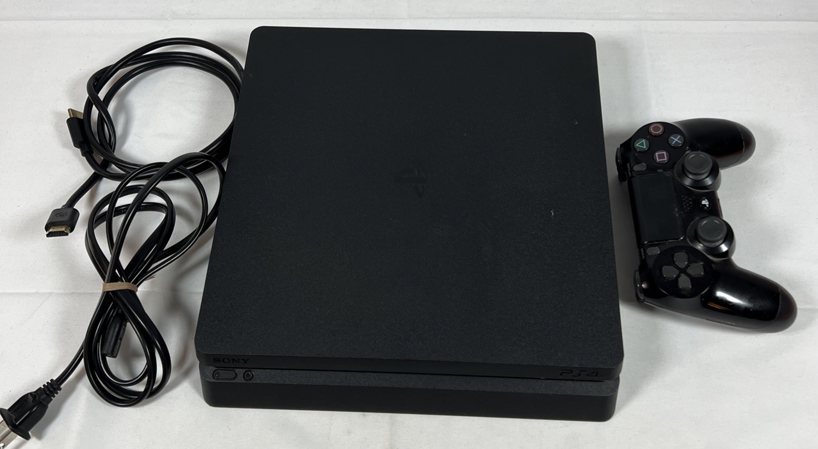Sony PlayStation 4 Slim 1TB Console Bundle – Black w/ DualShock 4 & HDMI TESTED