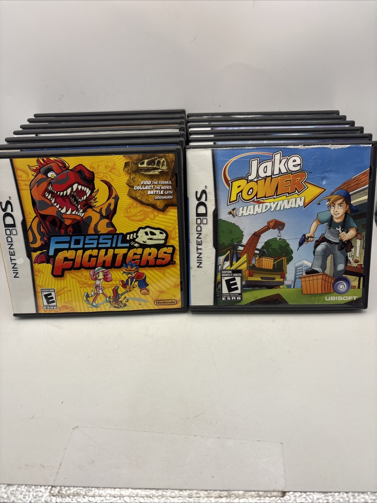 Nintendo DS Lite Metallic Rose Pink Console Bundle 13 Games Fossil Fighters CIB