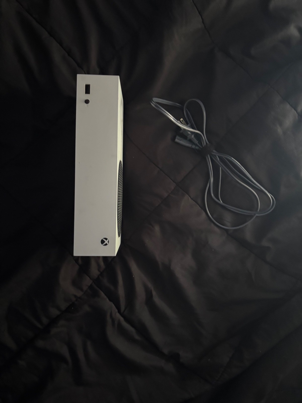 xbox series s console that comes with power cord, HDMI cord, and controller
