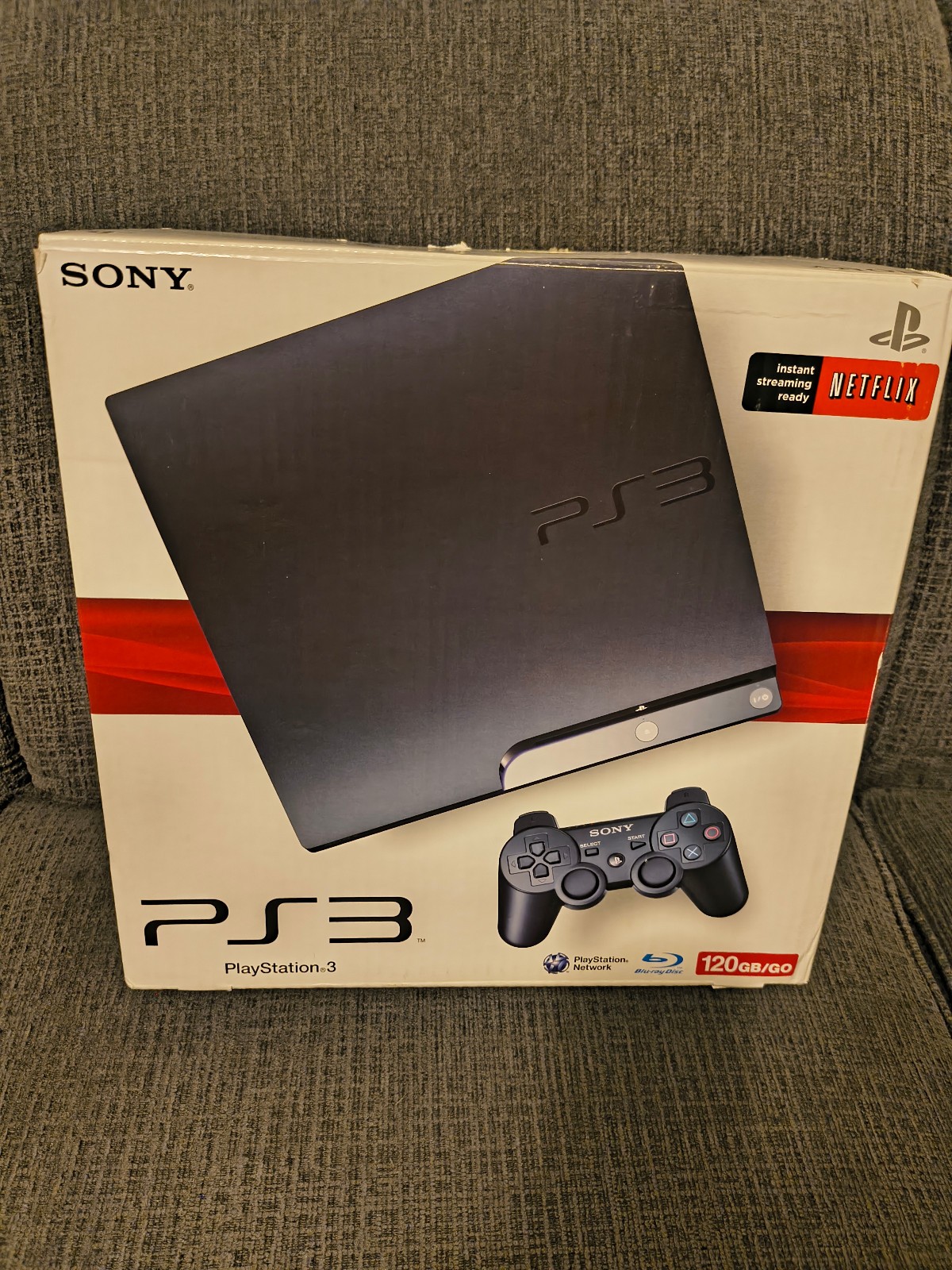 Sony PlayStation 3 Slim 120GB Console Bundle – 8 games, 2 controllers, cables
