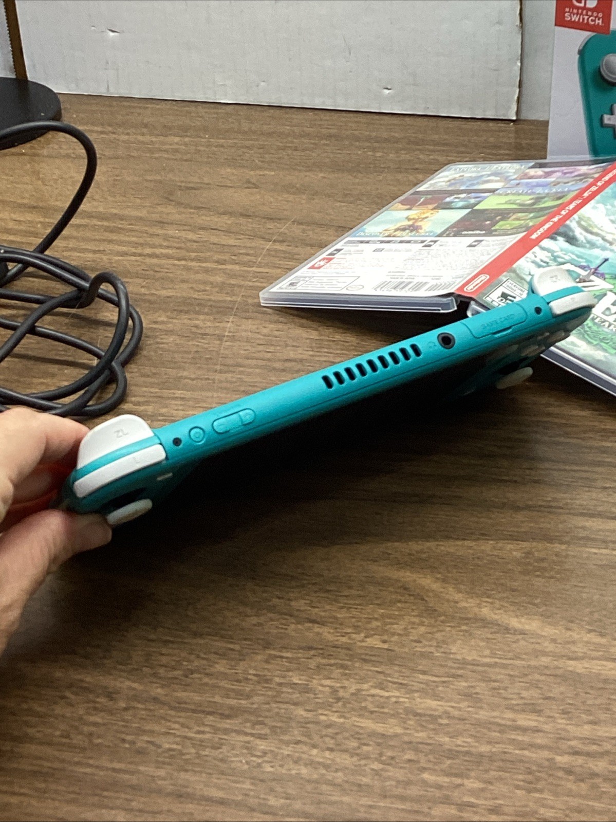 Nintendo Switch Lite Turquoise Teal Handheld Console Bundle with Zelda Game