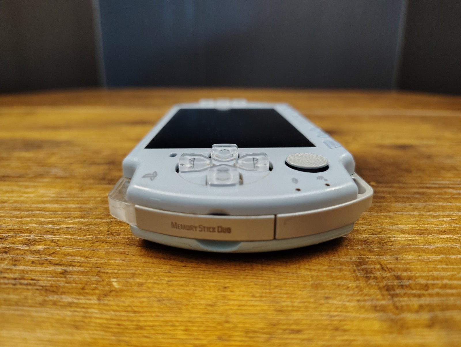 SILVER Sony PSP 2000 System Bundle With Games, Movies, And Cases