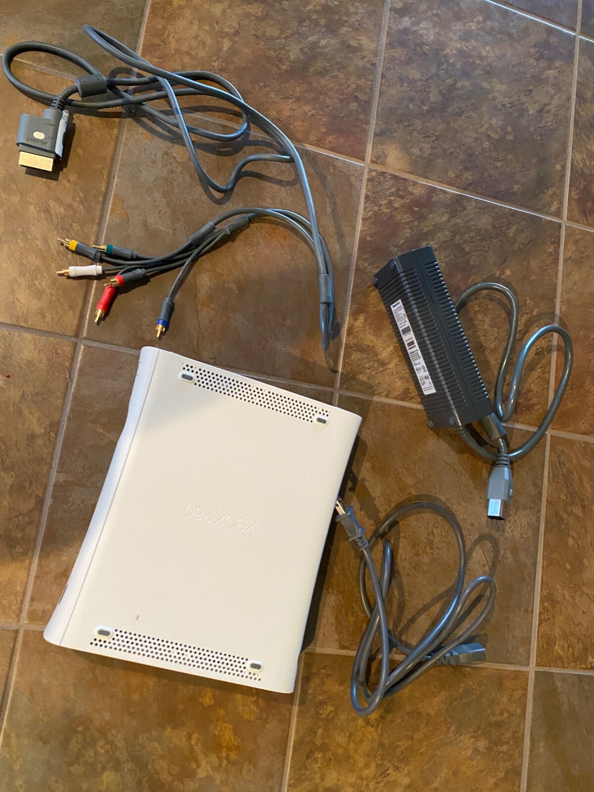 Xbox 360 Console Only Works well comes with A/V Cable and Power Cord