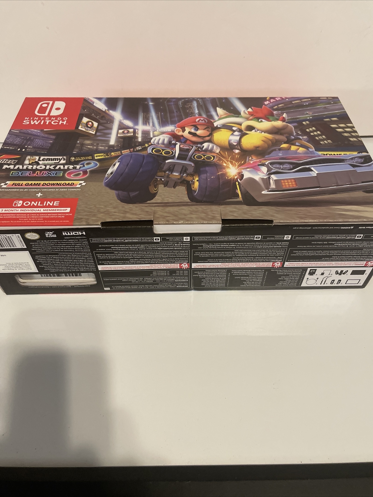 Nintendo Switch with Blue and Red Joy-Con Controllers and Mario Kart 8 Bundle