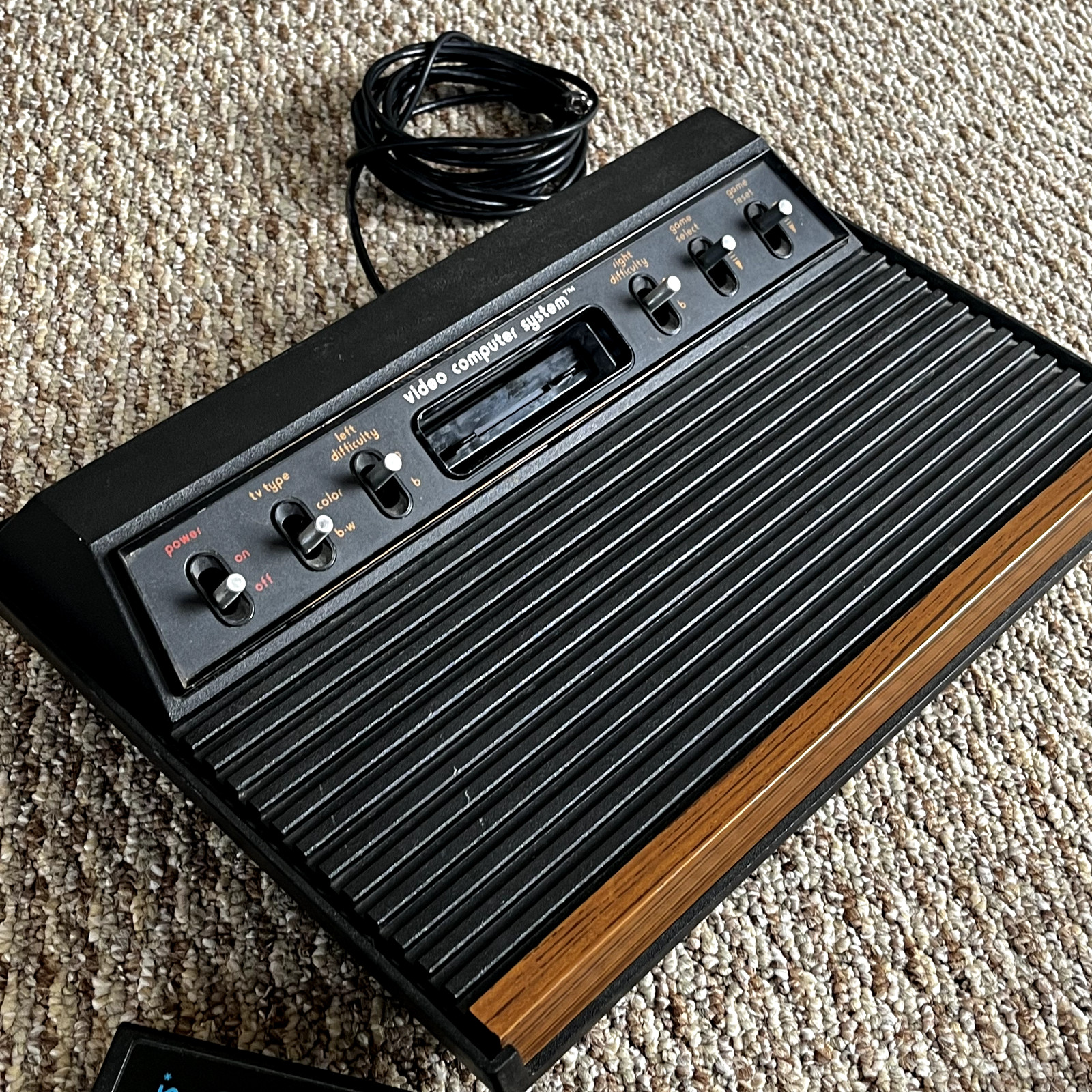 Atari 2600 light sixer w/ space invaders, pac-man, asteroids, boxing and more