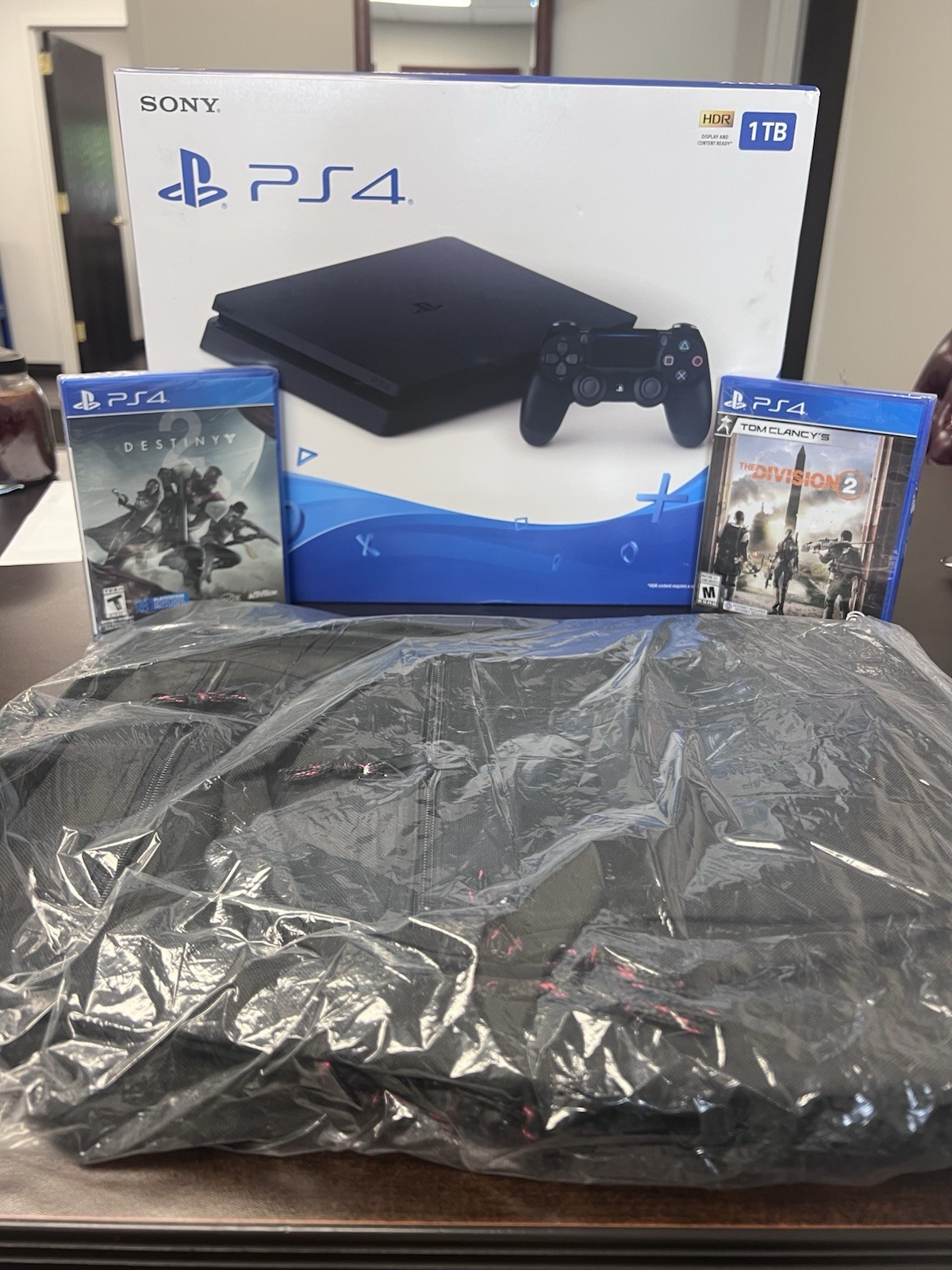 Sony PlayStation 4 Slim 1TB Console – Jet Black W/ 2 Games And Backpack