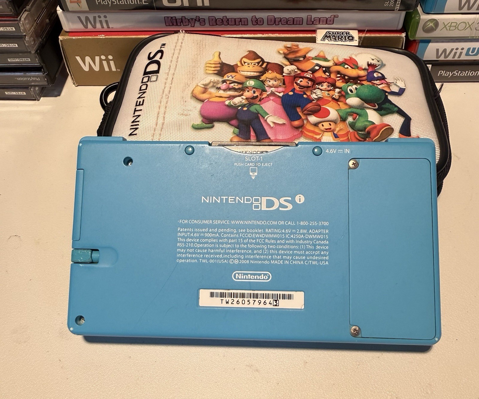 Nintendo DSi Aqua Blue Handheld Console Stylus Charger Monkeyball Tested Works