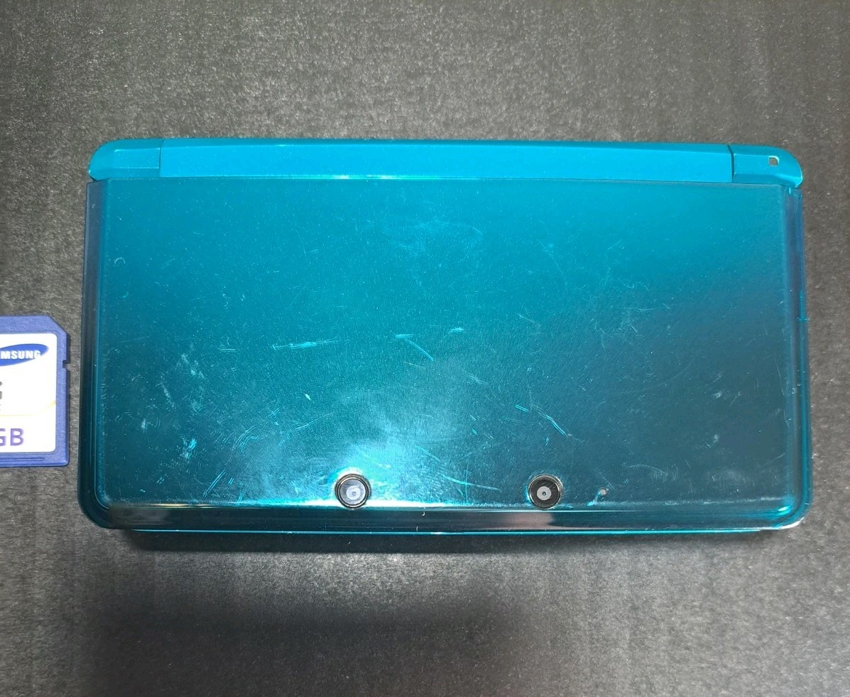 Nintendo 3DS Aqua Blue Handheld Console 3D Technology w/ Nyko Powerpak & 4GB SD