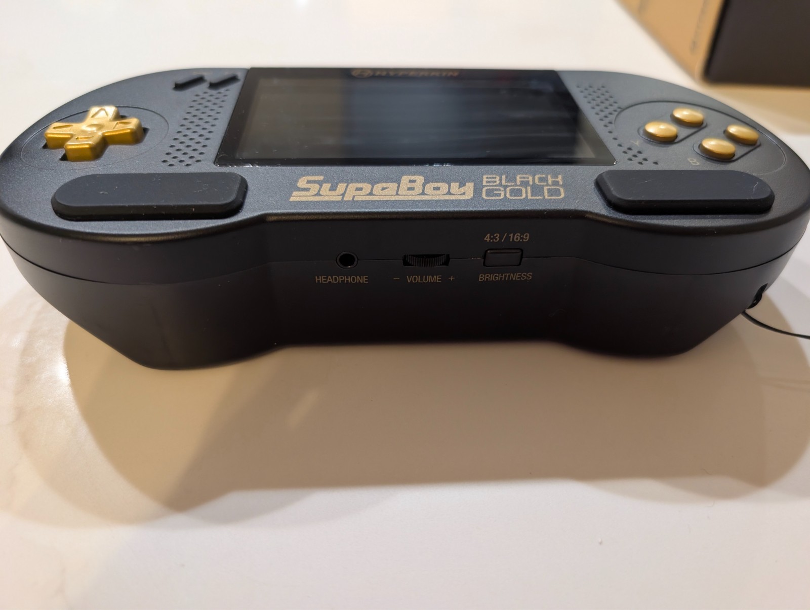 Used Hyperkin SupaBoy Portable Pocket BlackGold Console (Box & Manual Included)