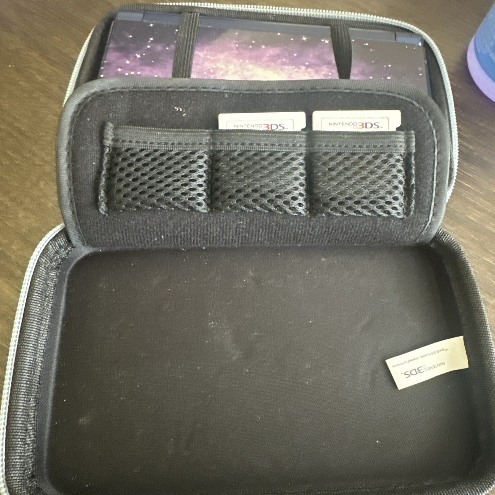 Nintendo 3DS XL Galaxy Edition Handheld Console with Charger, Case, and 2 Games