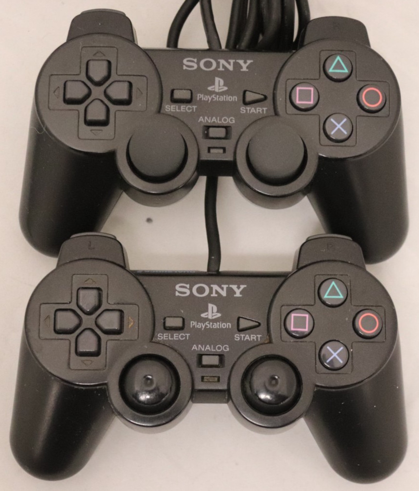 Sony PlayStation 2 Slim (SCPH-75001) W/ two controllers