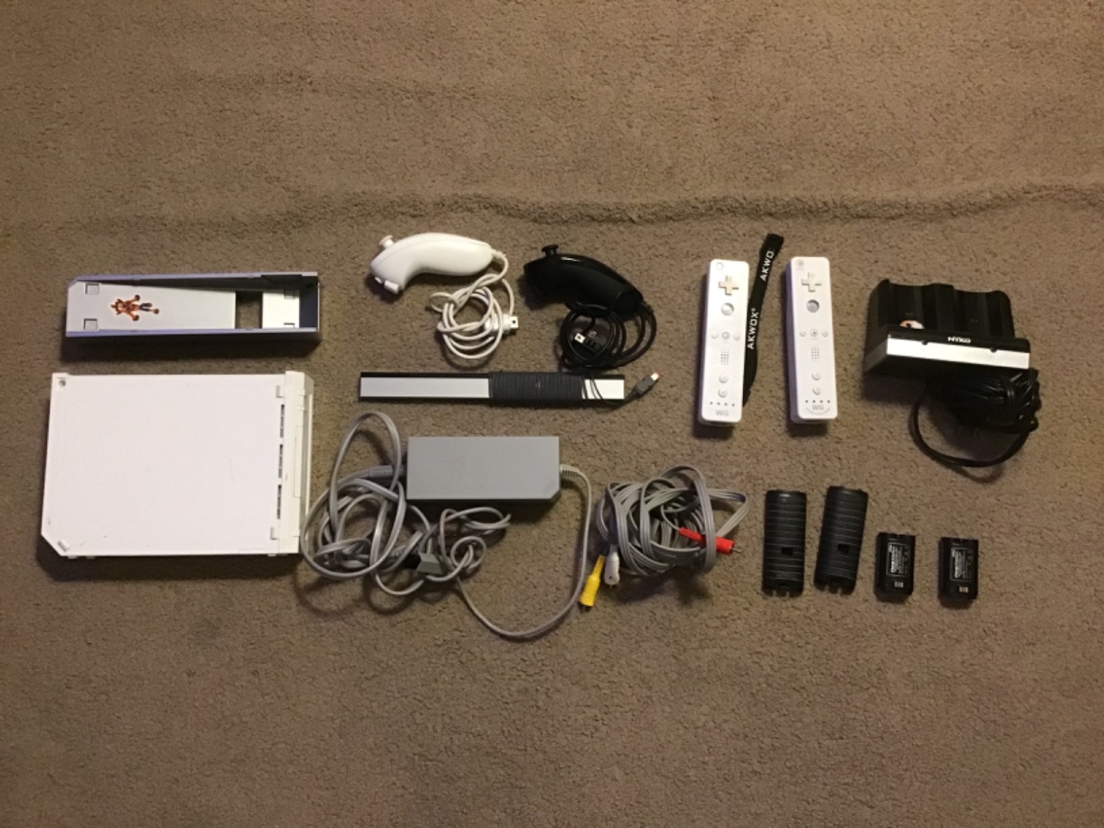 Nintendo Wii Console Bundle With Extra Controller, Nunchuck, Charging Pack