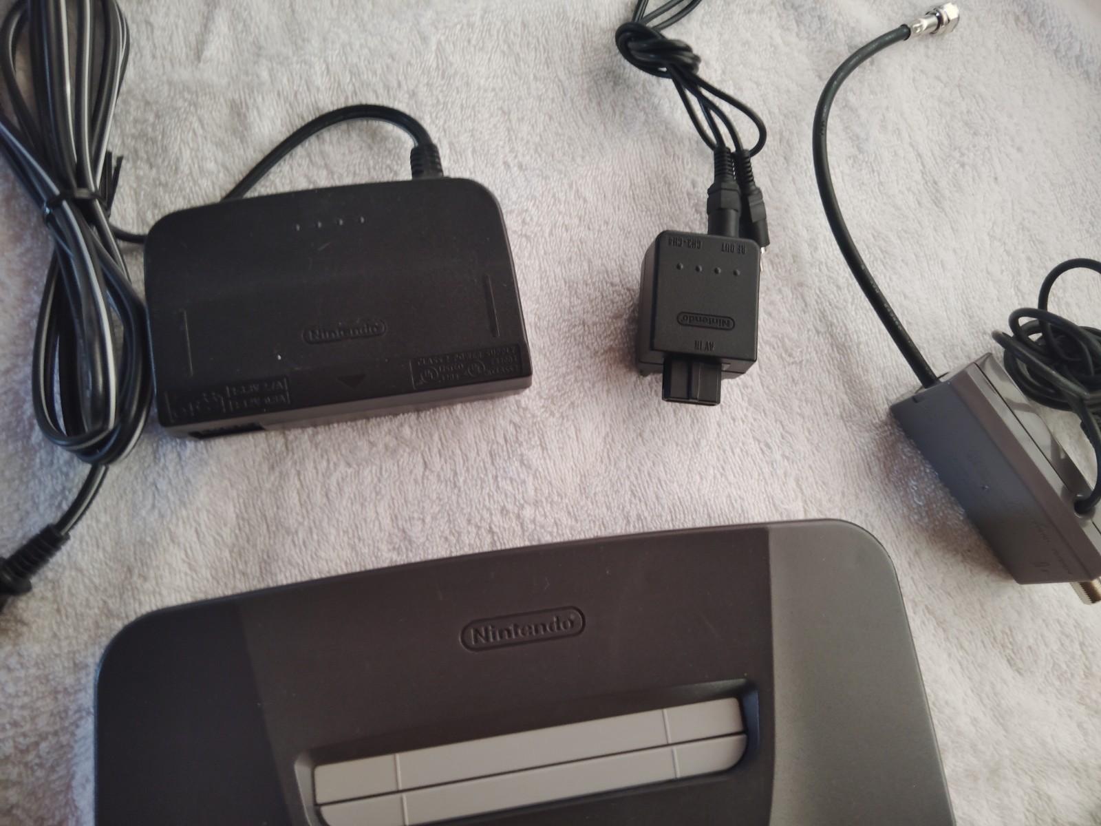 Nintendo 64 Gray Console with Purple Controller and Cables