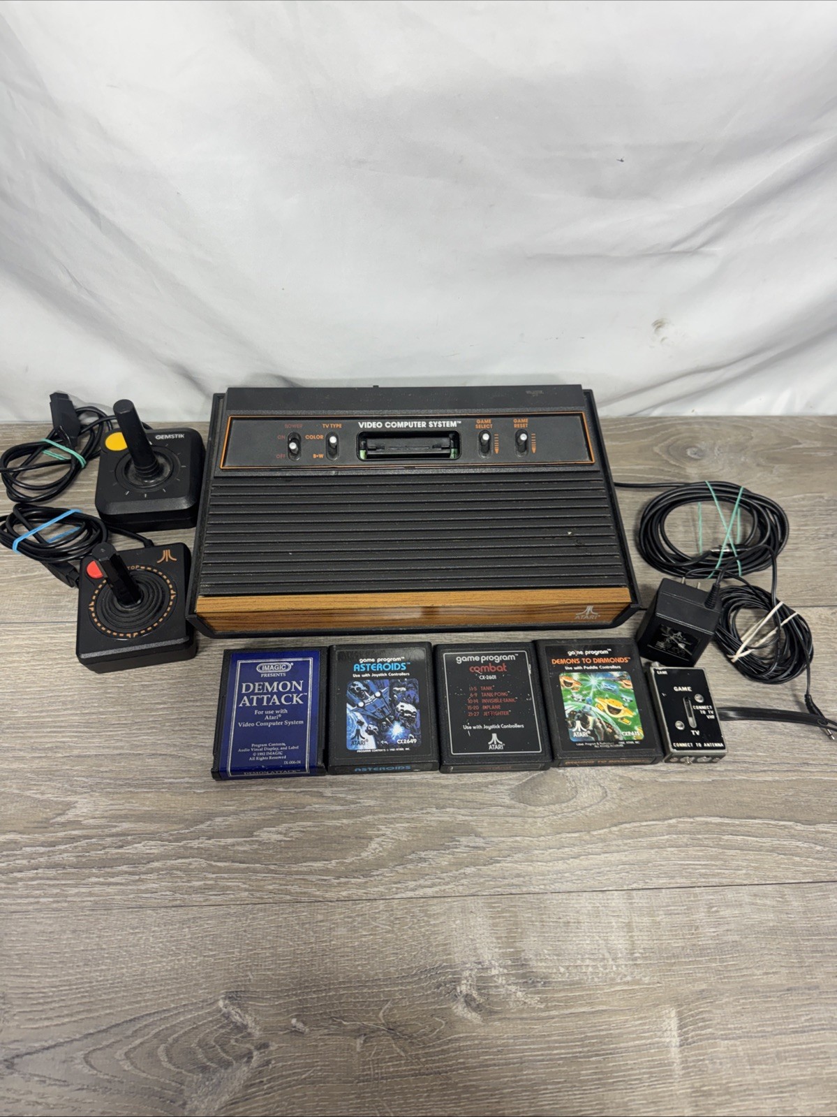 Atari 2600 4-Switch Woodgrain Console Bundle w/ 2 Joysticks, 4 Games Working