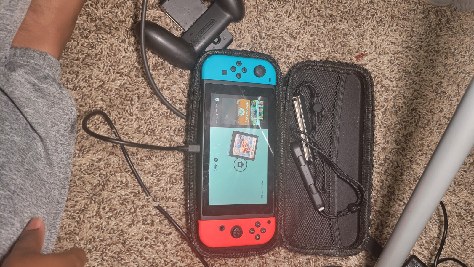 Nintendo Switch with Blue and Red Joy-Con Controllers & Mario Kart