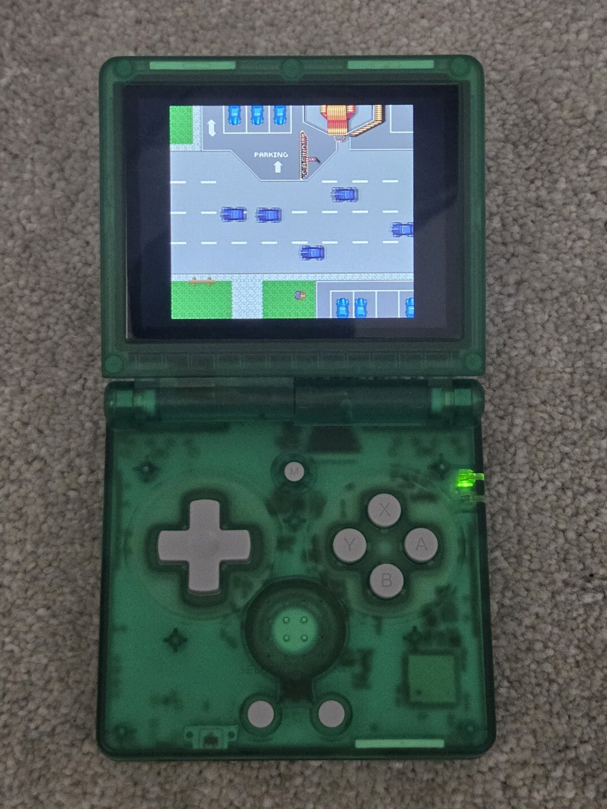 Anbernic game console RG35XXSP retro handheld transparent green tested arcade