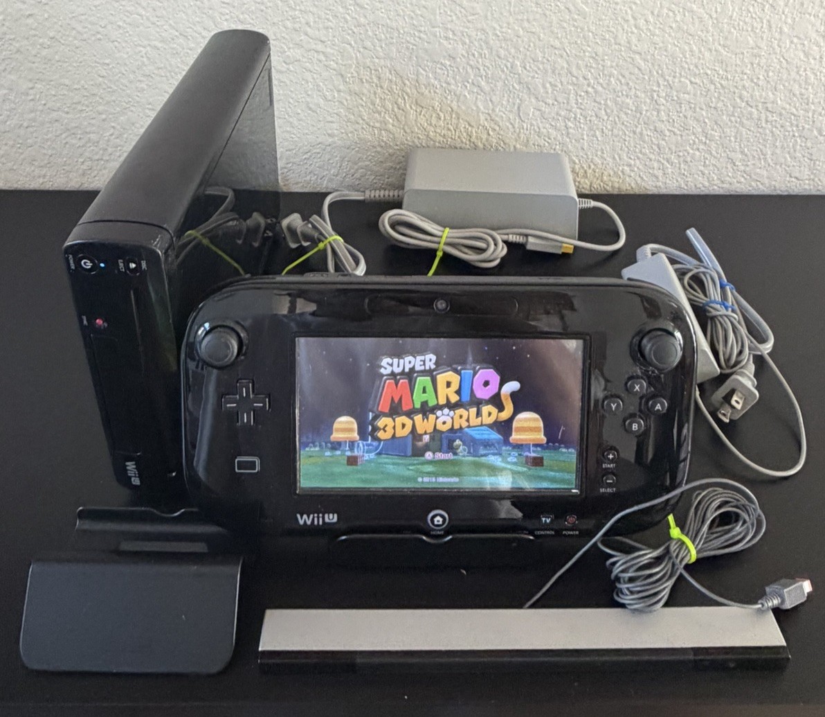 Nintendo Wii U Deluxe 32 GB Console w GamePad, Stand, and Charging Base w Games