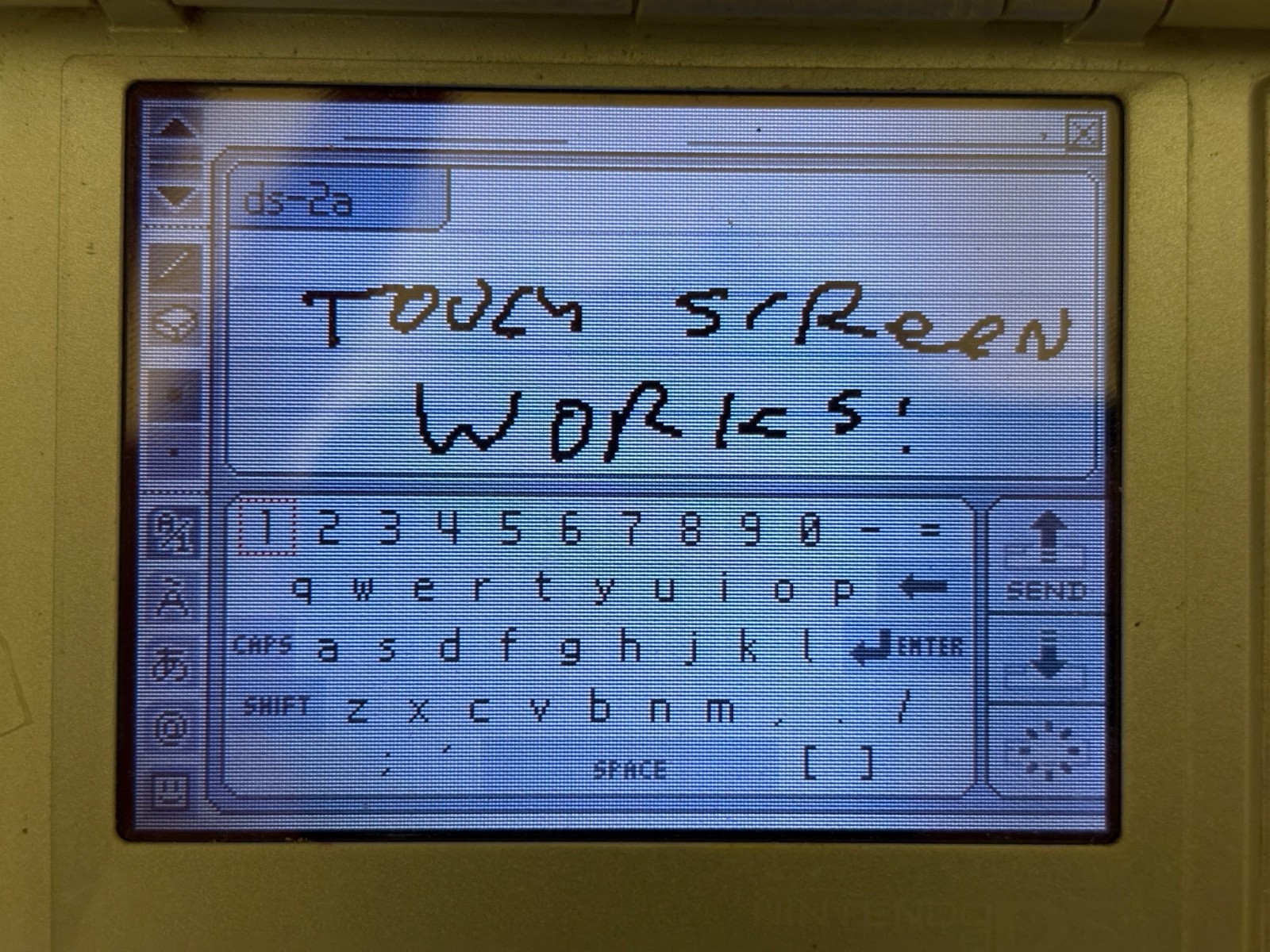 Nintendo DS Silver Handheld System – Fair Condition – TESTED AND WORKING! (2A)