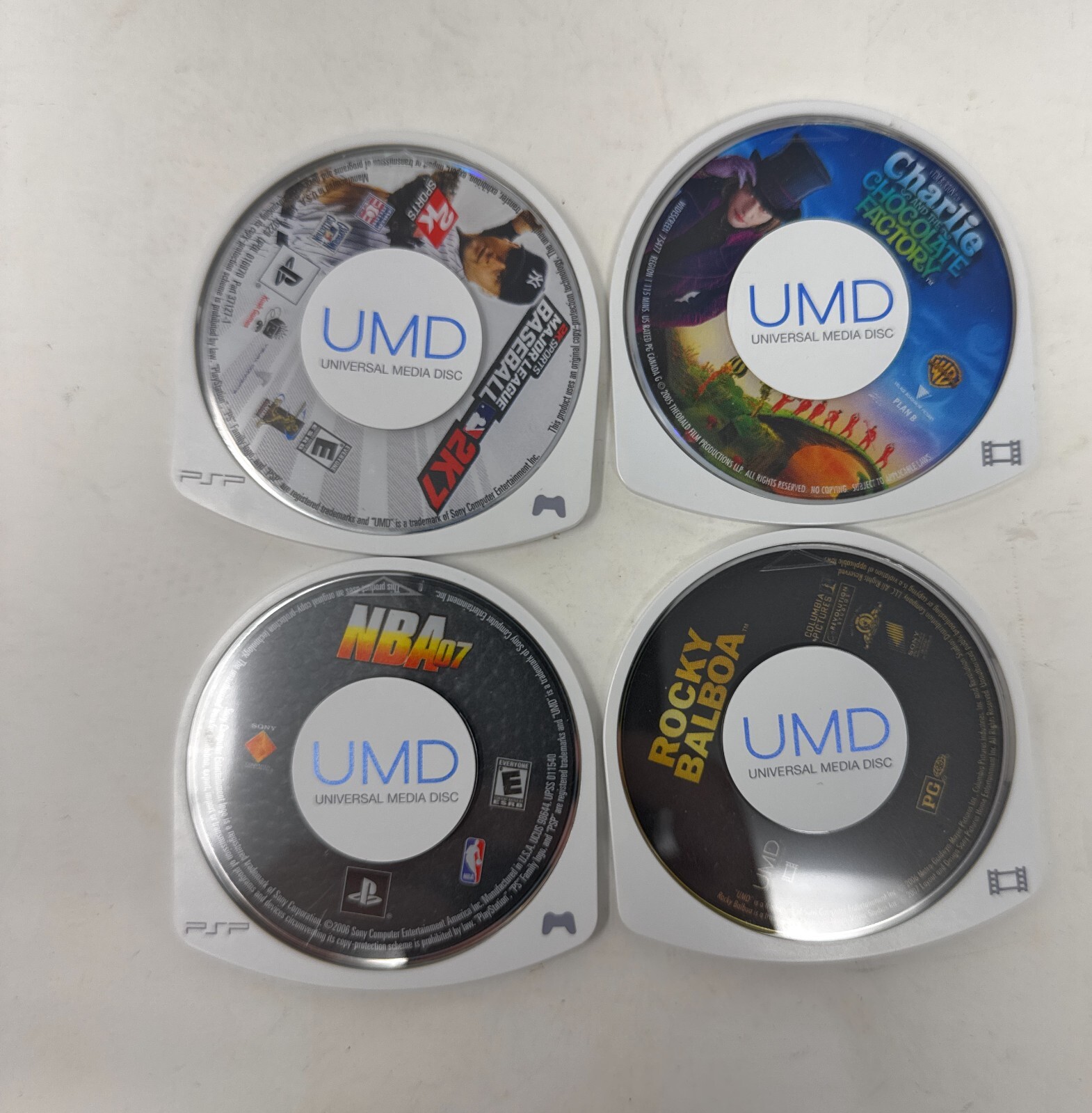 PlayStation PSP 1001 Bundle 2 Games 2 Movie Console and Game Case AC Adapter