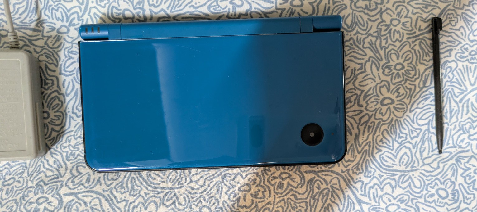 Nintendo DSi XL Midnight Blue. Tested and Working. FREE SHIPPING.