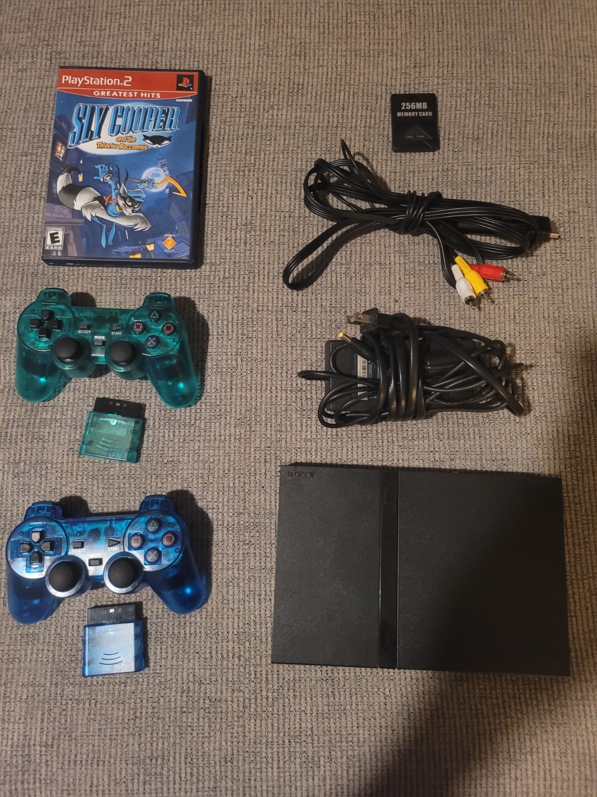 Sony PlayStation 2 Slim Power Cord with 2 Controllers And Sly Cooper