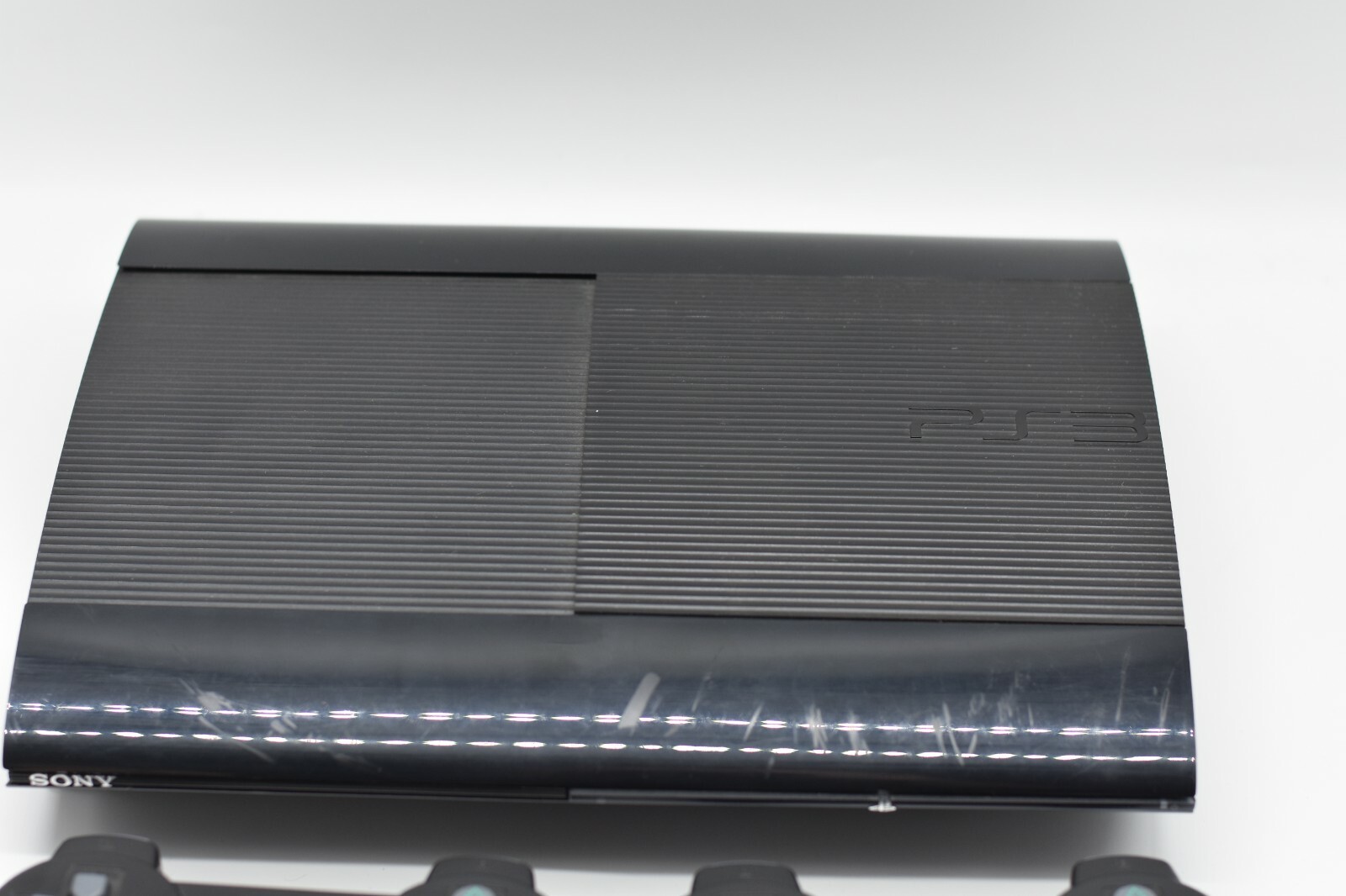 Sony PlayStation 3 PS3 Super Slim Console – 2 controllers – 2 games – FAST SHIP
