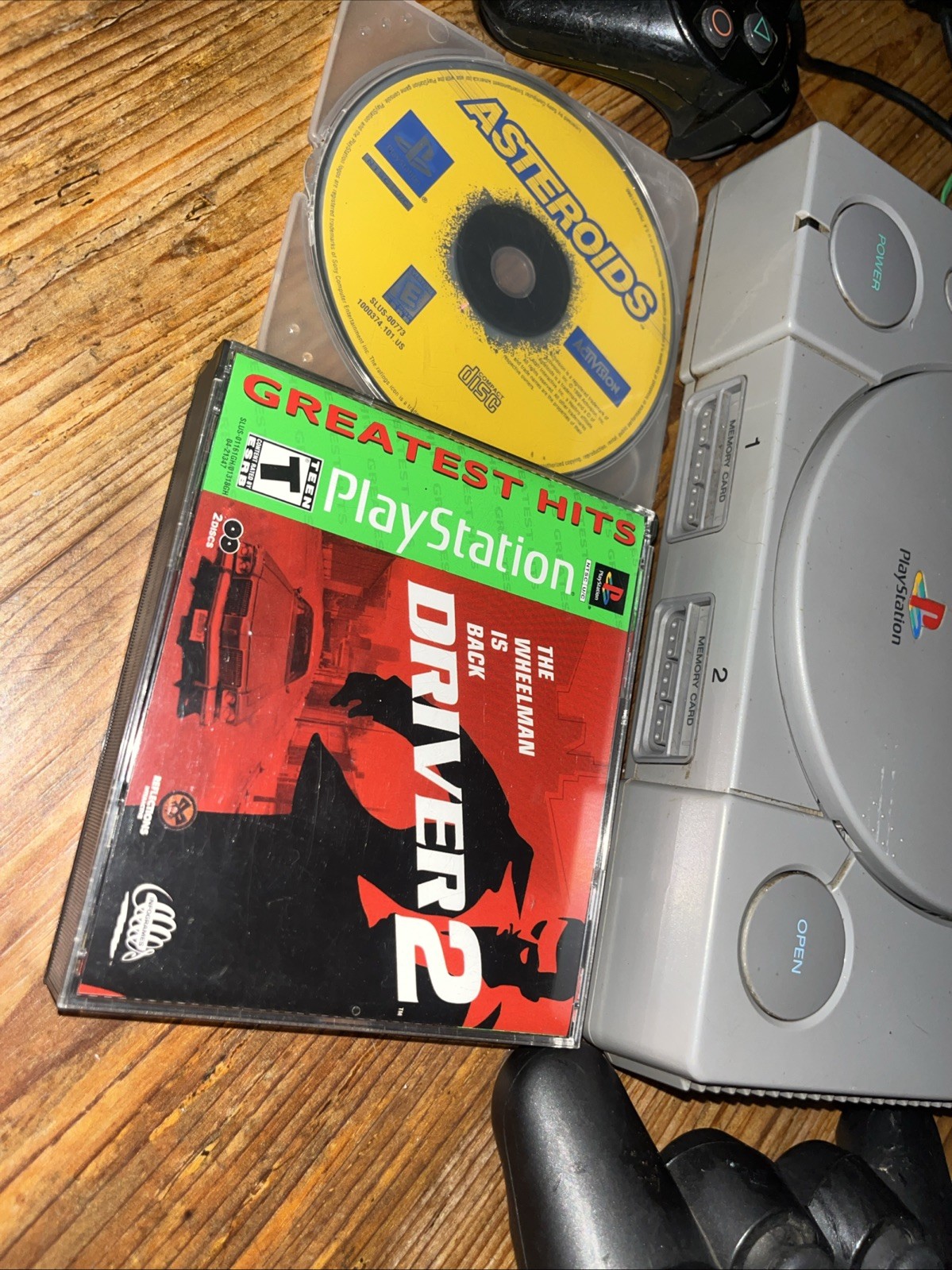 Sony Playstation 1 Gray Console With Games Controllers, A/V Cable, and Power