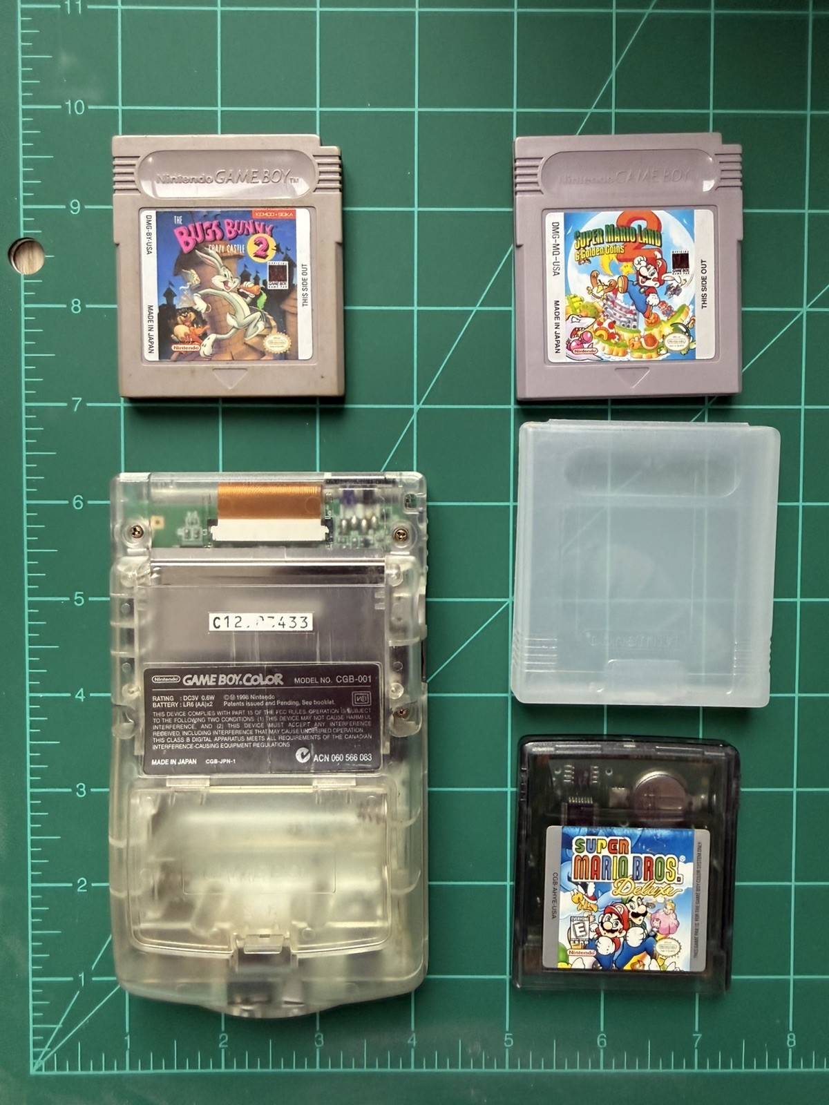 Nintendo Game Boy Color Clear + 3 Game Lot Super Mario Land 2 Bros Deluxe Bugs