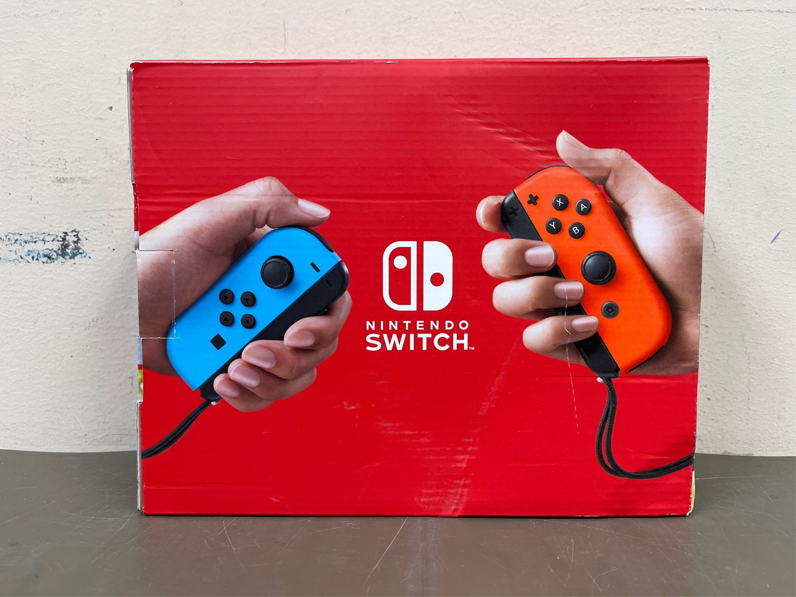 Nintendo Switch with Blue & Red Joy-Con