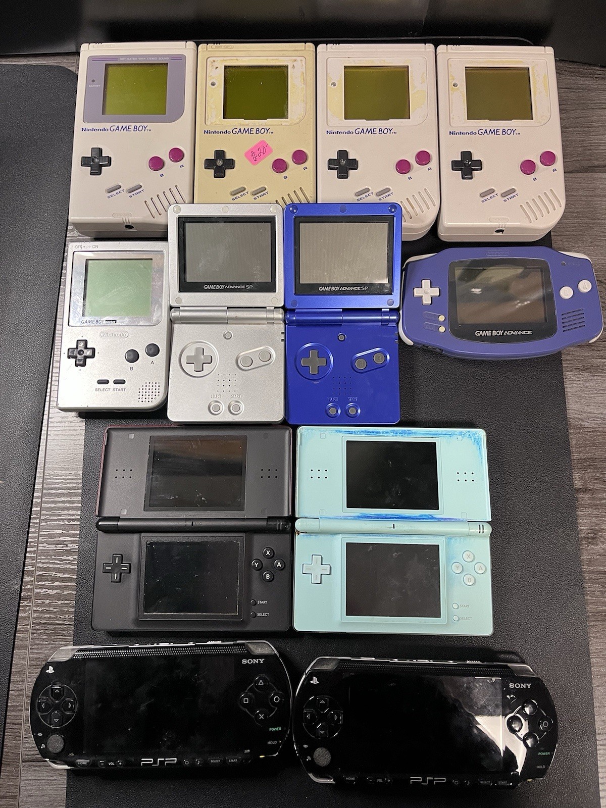 Lot Of NINTENDO,PSP FOR PARTS REPAIR ONLY 12 HAND HELD DEVICES Total
