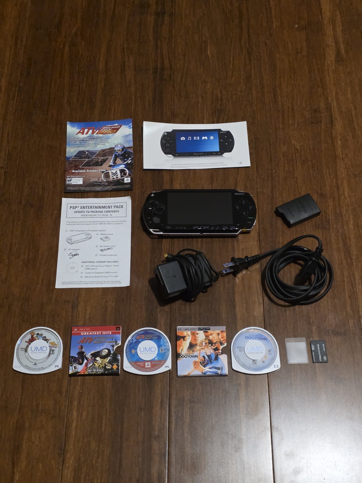 Sony PSP 1001 Piano Black Bundle With Games And Original Card Insert – Pre-Owned