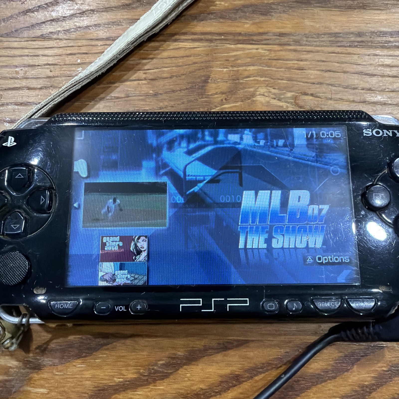 PSP 1001 – Missing Battery – Needs Charger Cord – Comes w/ Games – See Disc.