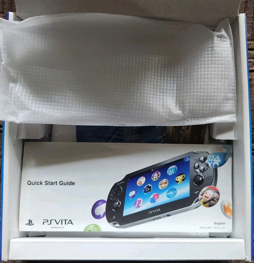 PlayStation PS Vita The Walking Dead Bundle w/64 GB Memory Card, Case, Two Games