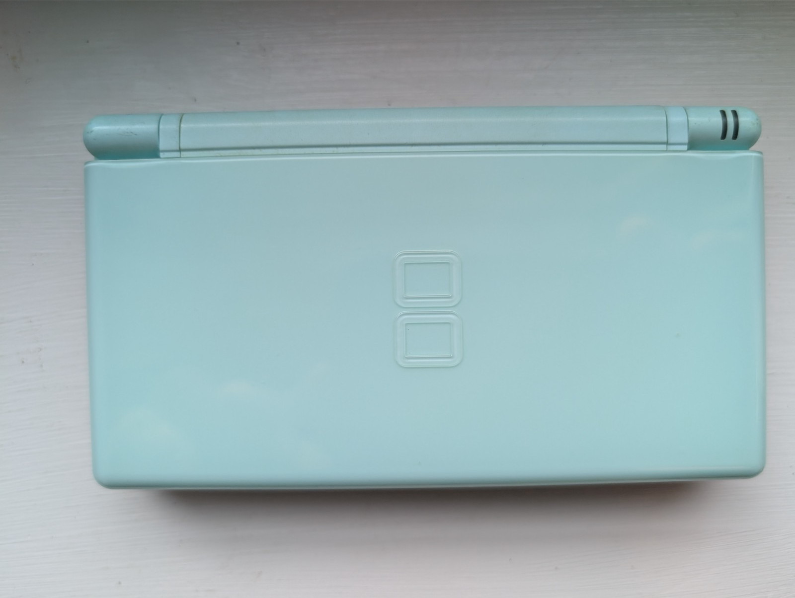 Nintendo DS Lite Handheld Console – ICE BLUE – TESTED – w/ slot cover + stylus