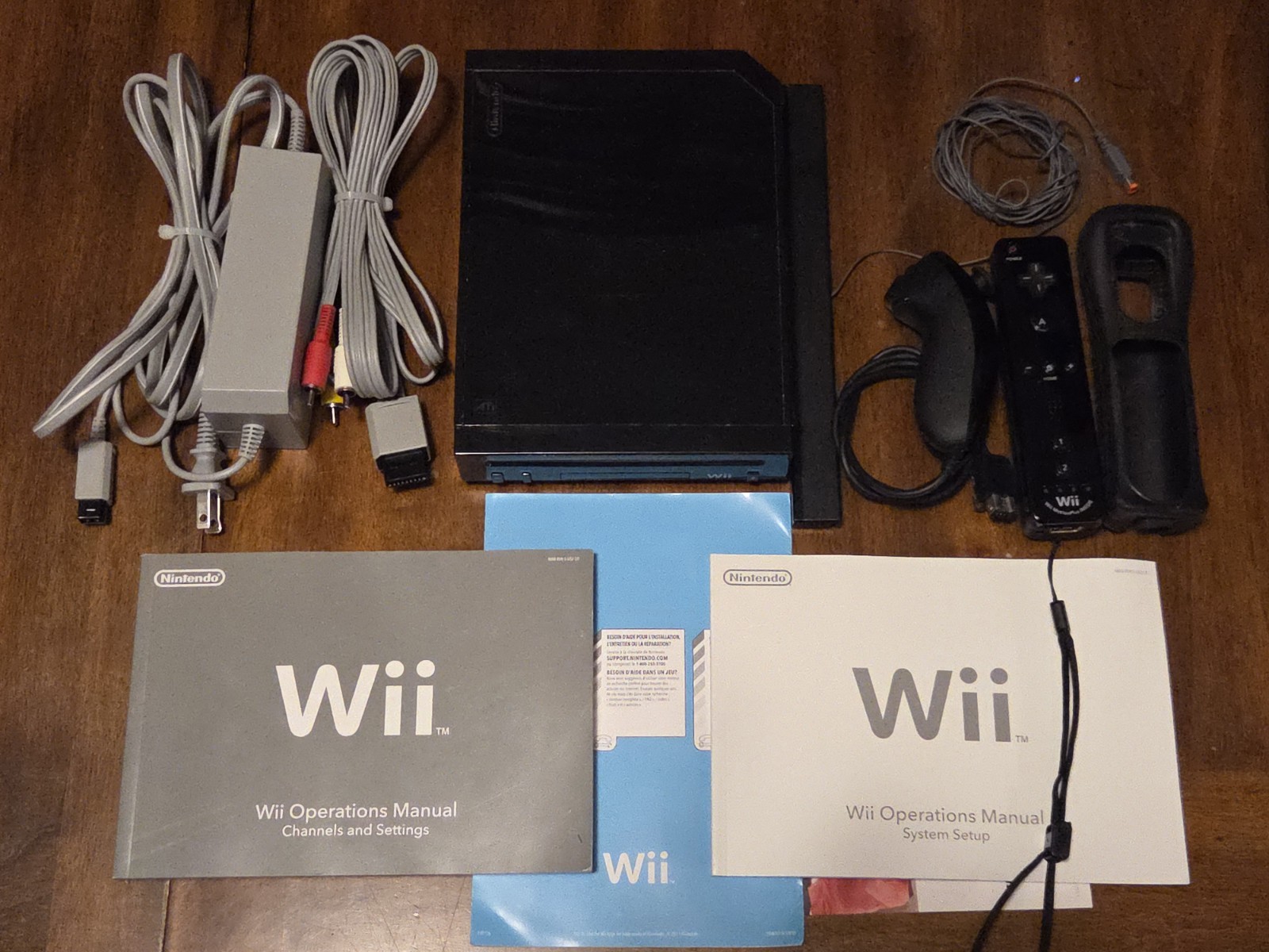 Nintendo Wii Family Console Black RVL-101 with Wii Sports and Wii Sport Resort