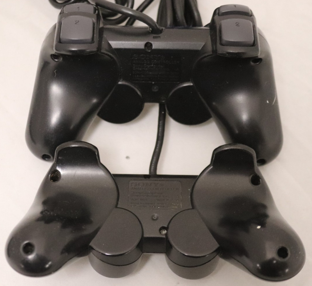 Sony PlayStation 2 Slim (SCPH-75001) W/ two controllers
