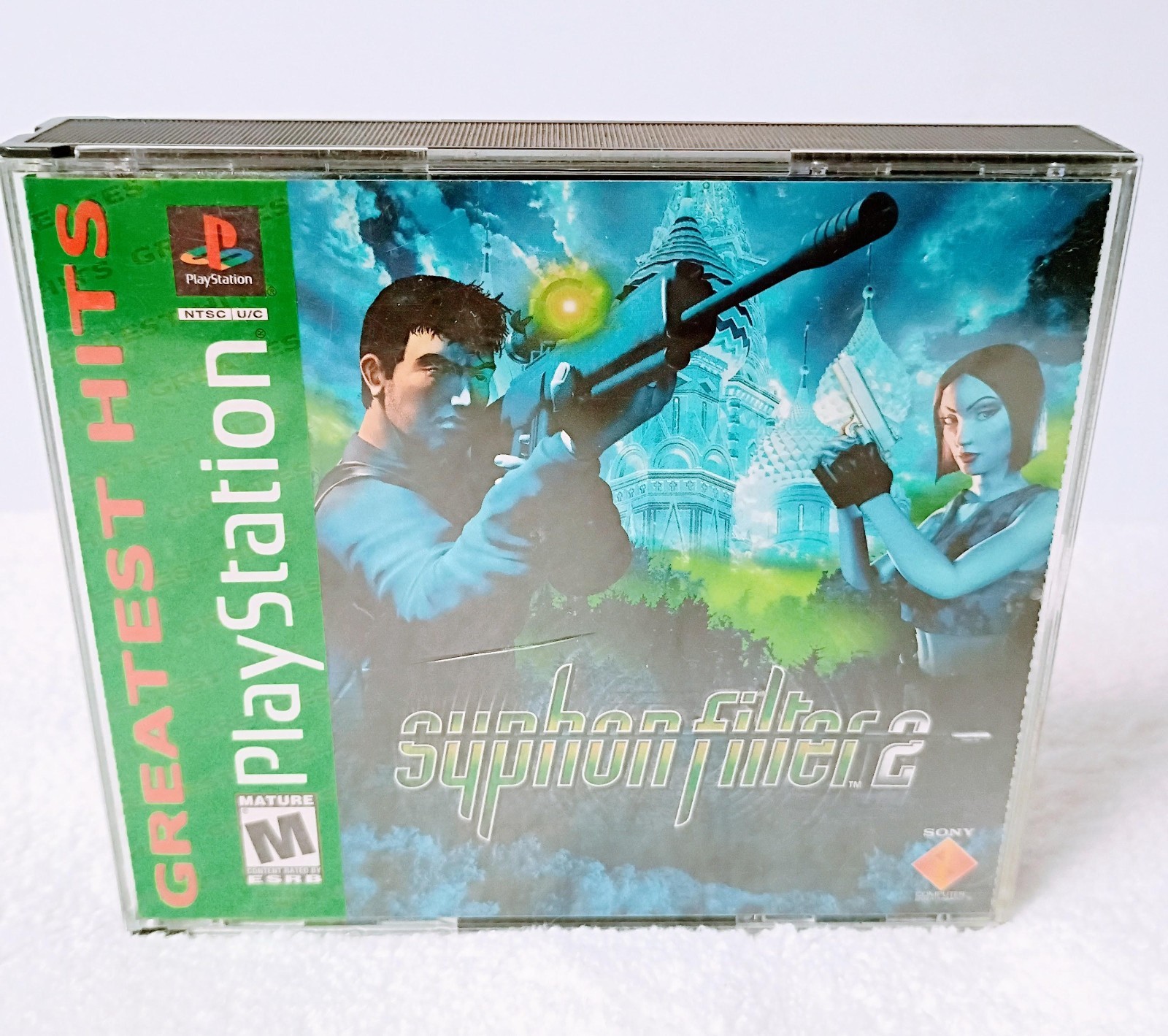 Playstation 1 with 1 controller, AV Cable, power cable and Syphon Filter 2 game