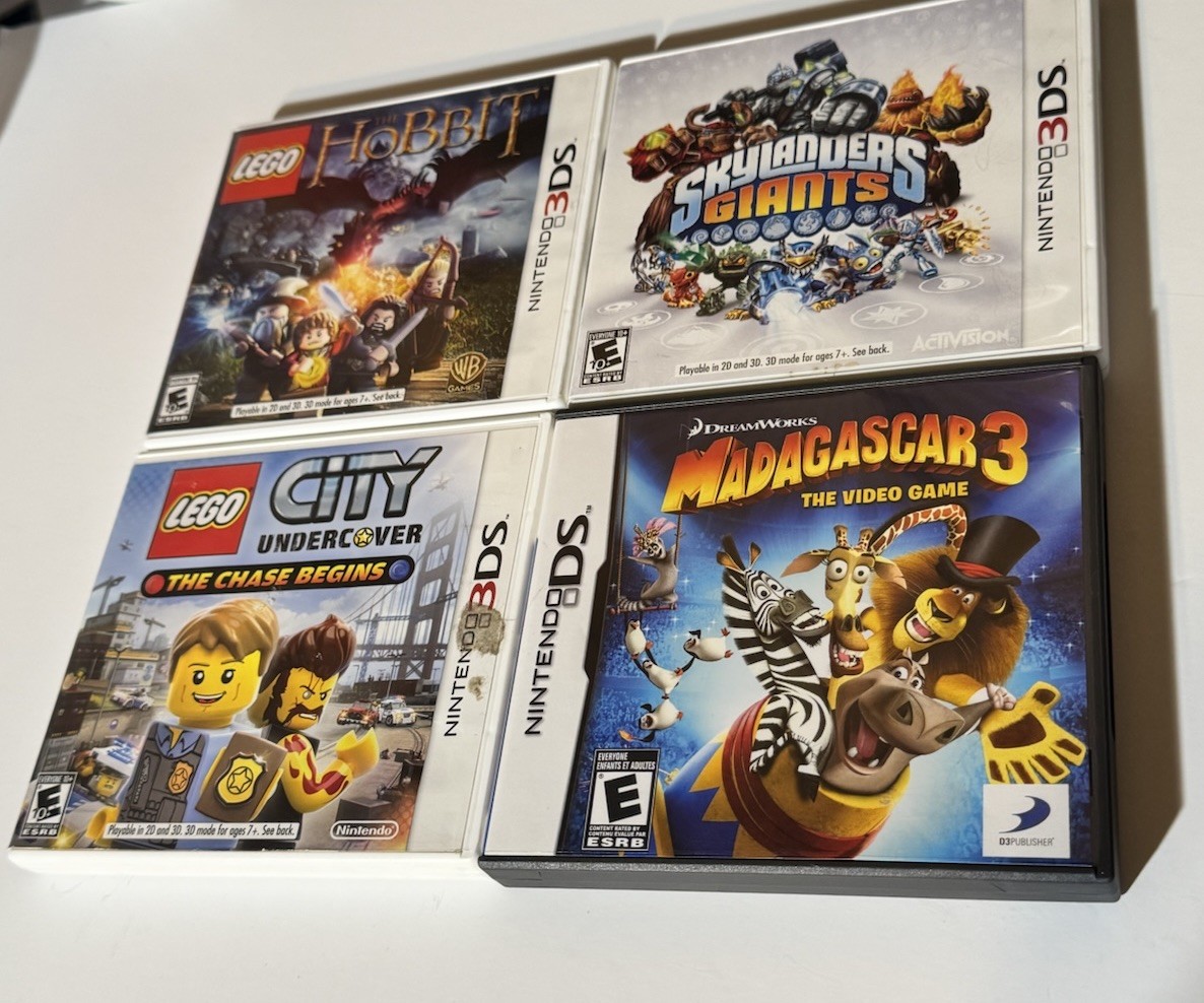 NINETENDO 3DS XL CONSOLE WITH 15 GAMES IN CASES & MANUALS 9 GAMES NO CASES