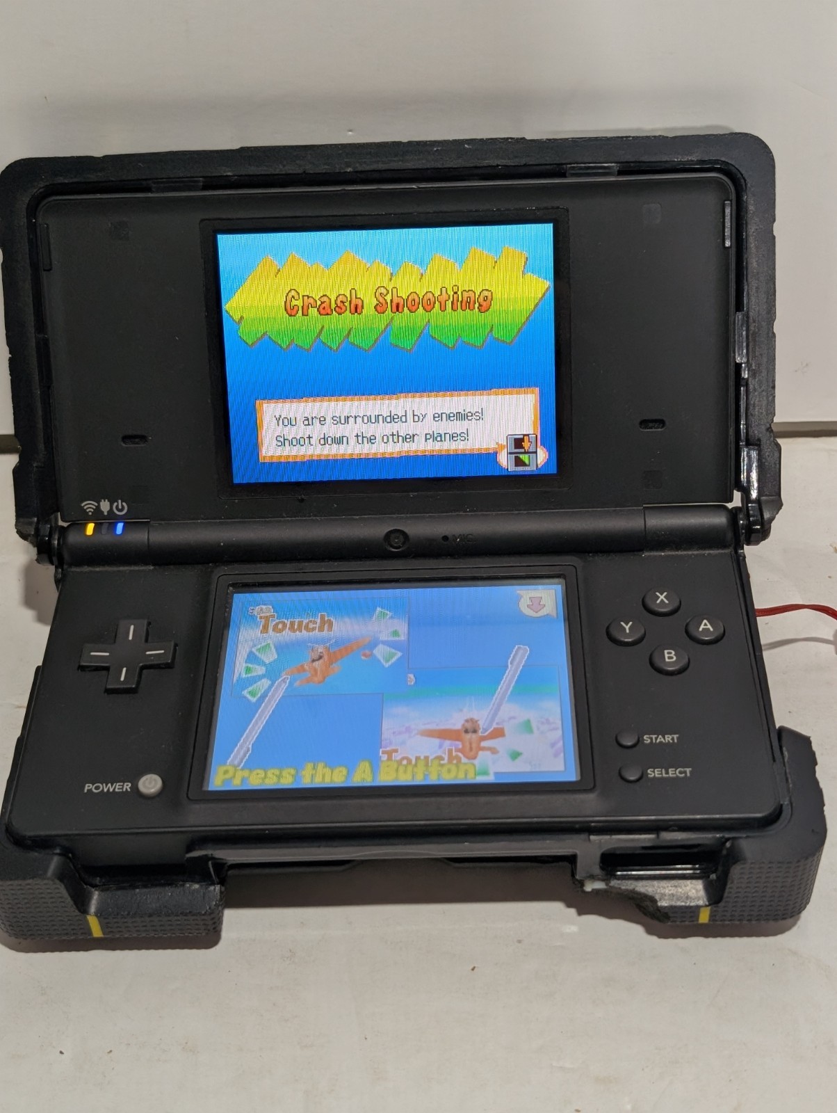 Nintendo DSi Bundle (DSi + NERF Case + Charger + Stylus + Game)