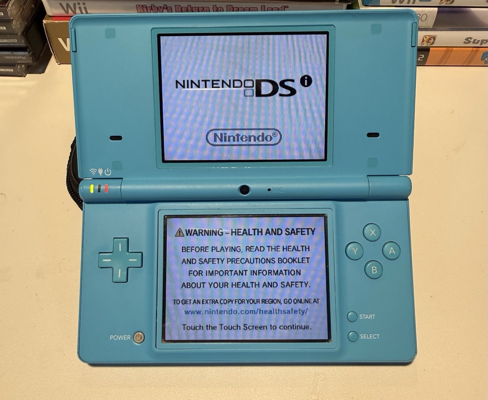 Nintendo DSi Aqua Blue Handheld Console Stylus Charger Monkeyball Tested Works