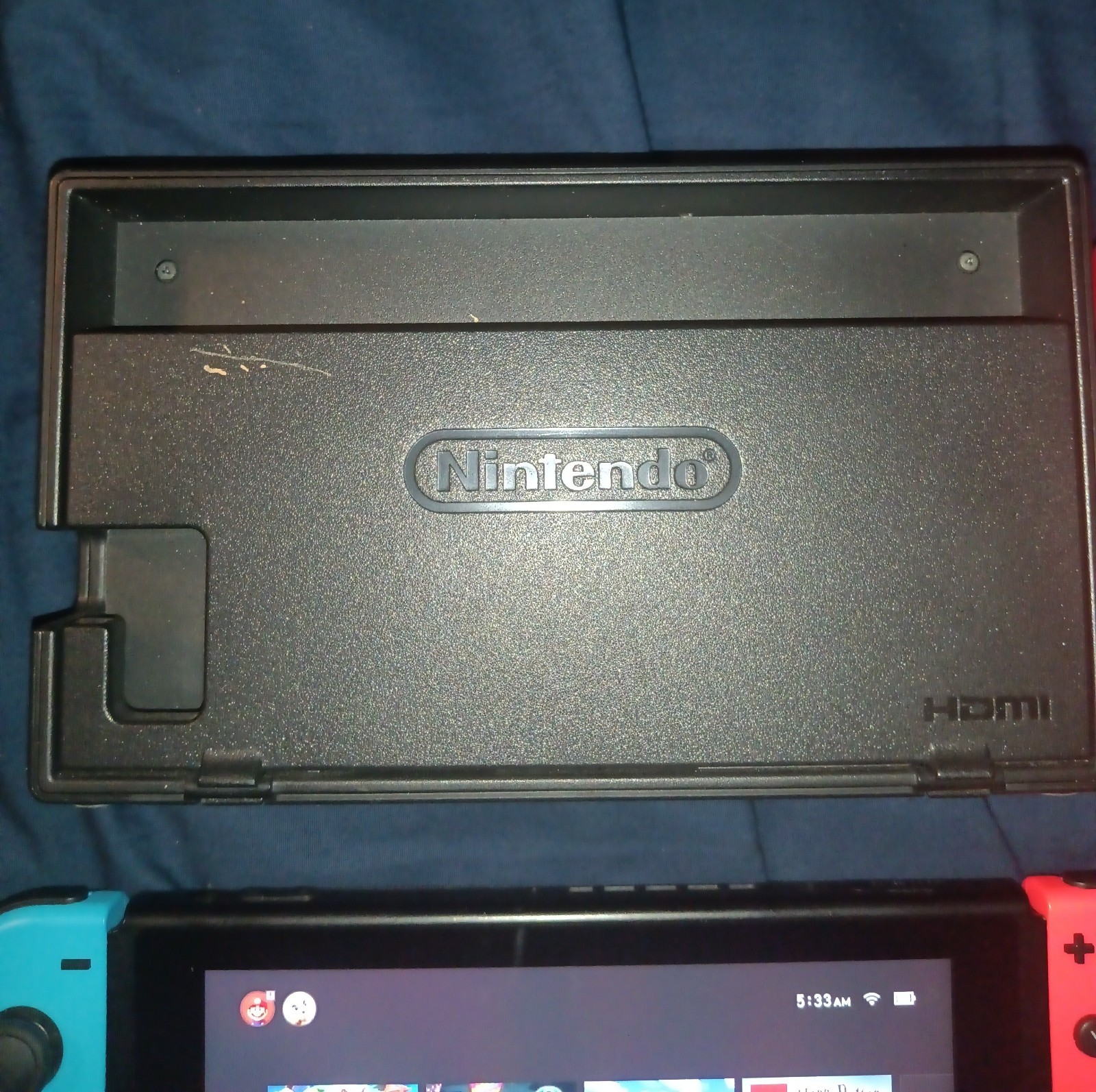 Nintendo Switch console with dock and two controllers