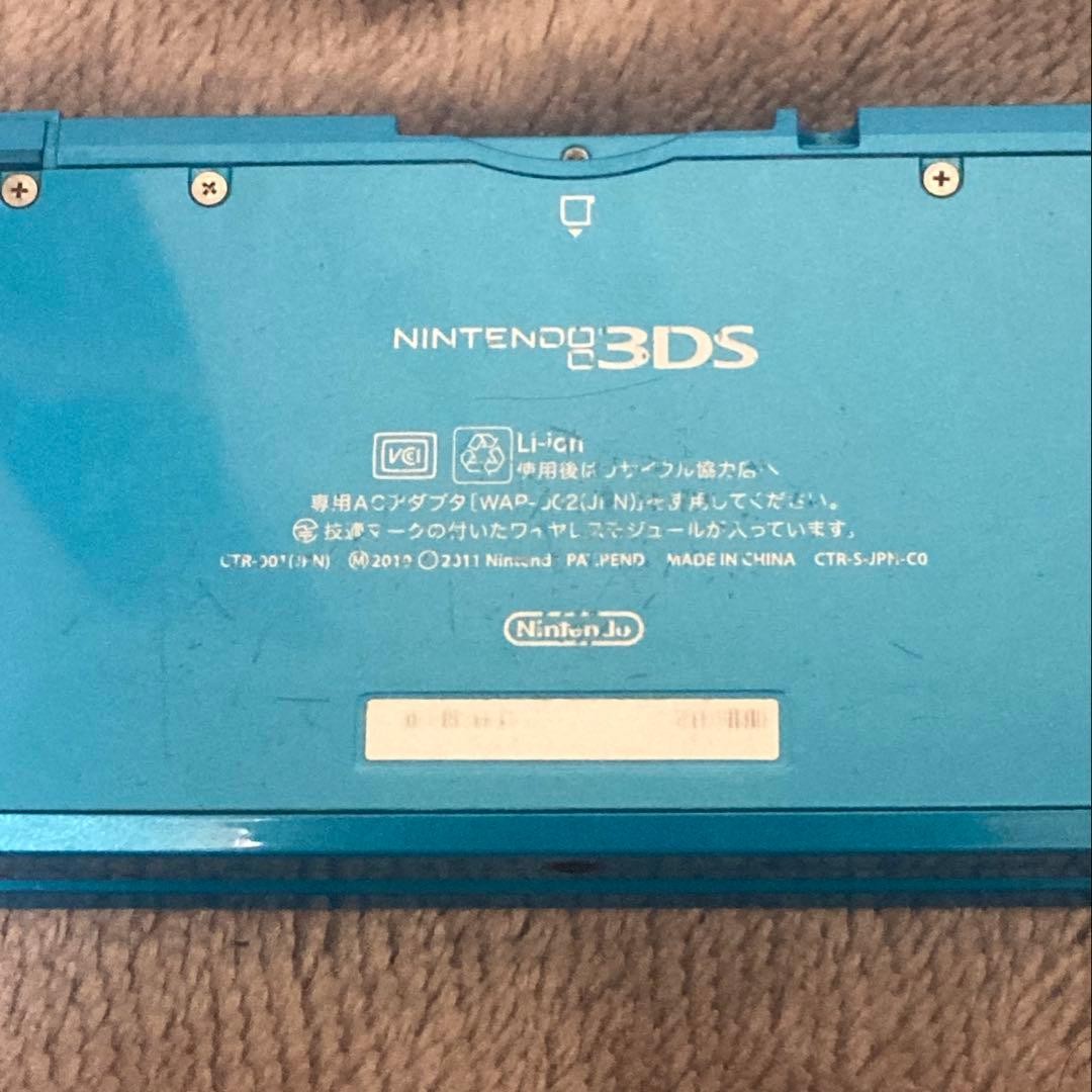 Nintendo 3DS Light Blue console with box charger and games (including Legend of