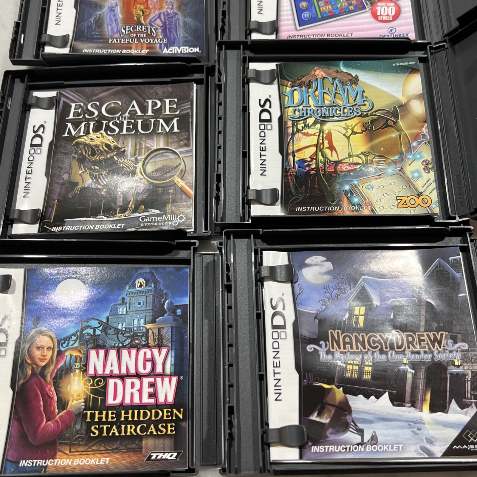 Nintendo DS Lite Cobalt Blue Console Bundle 9 Games New Battery Charger Cases