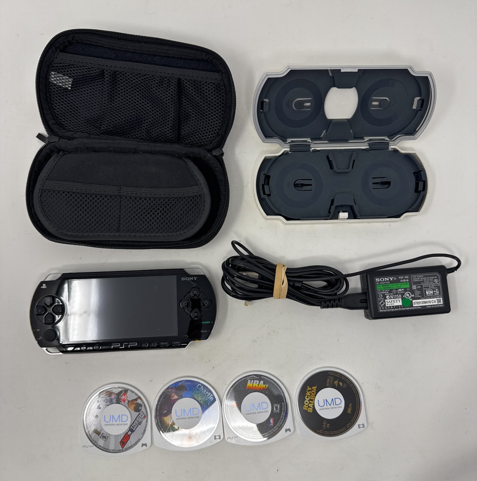 PlayStation PSP 1001 Bundle 2 Games 2 Movie Console and Game Case AC Adapter