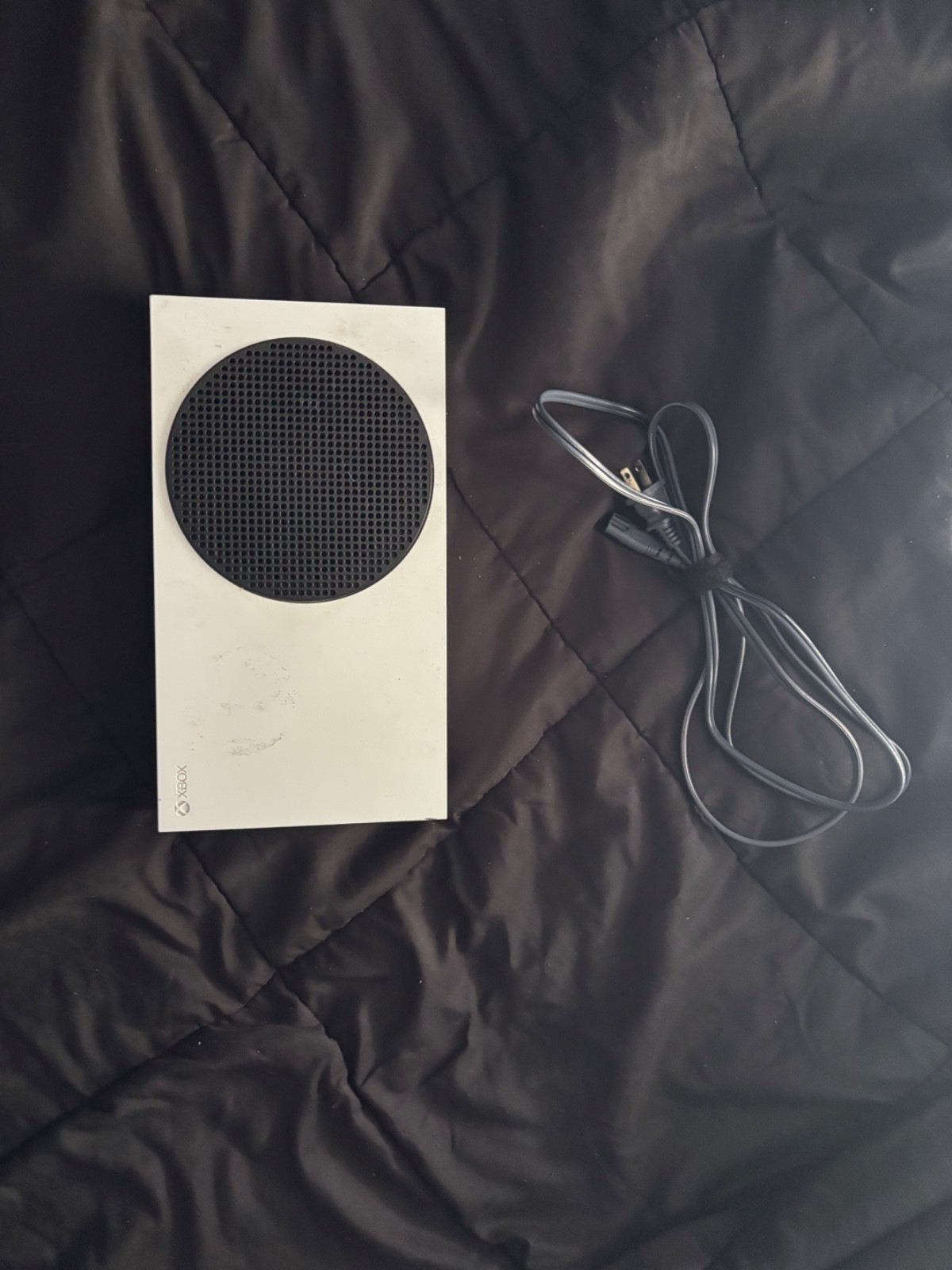 xbox series s console that comes with power cord, HDMI cord, and controller