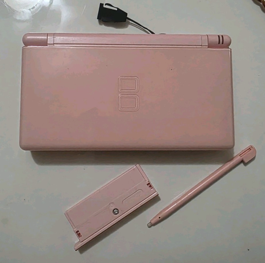 Nintendo DS Lite Pink Handheld Console w/ Case Charger Not Included Working.
