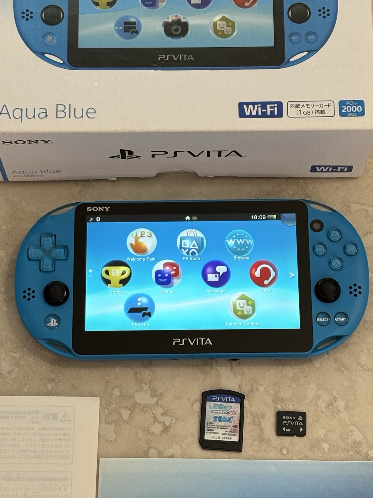 Sony PS Vita PCH-2000 Complete In Box – Aqua Blue 4GB Very Good Condition